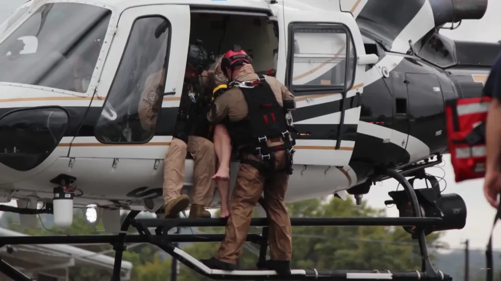 As flood waters rise, many are trapped. Will first responders from above save the day?